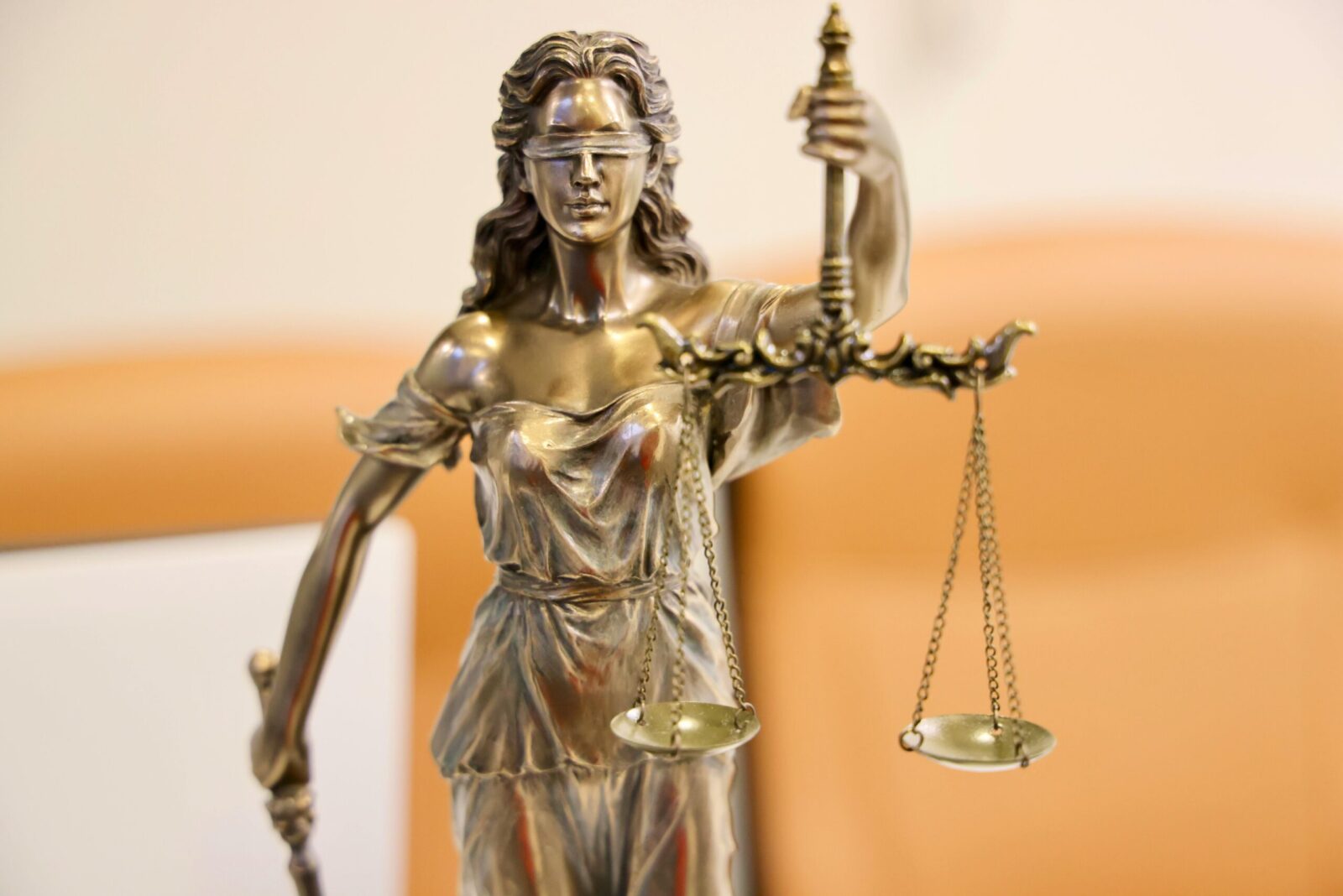 Detailed image of Lady Justice statue, symbolizing fairness and impartiality.